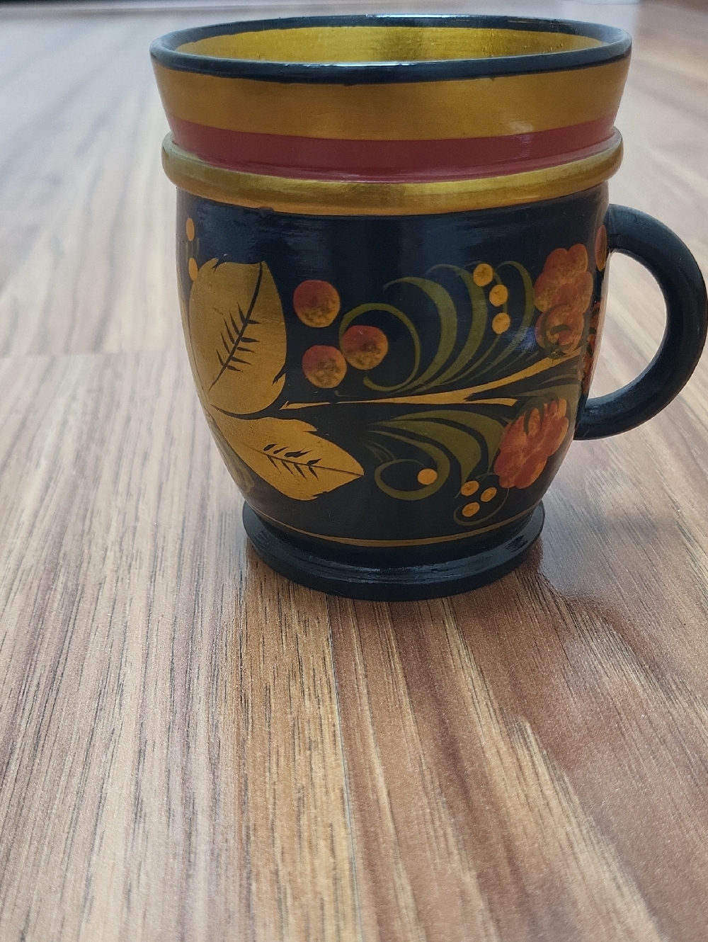 Khokhloma Hand-Painted Black Floral Wooden Mug with Gold Accents